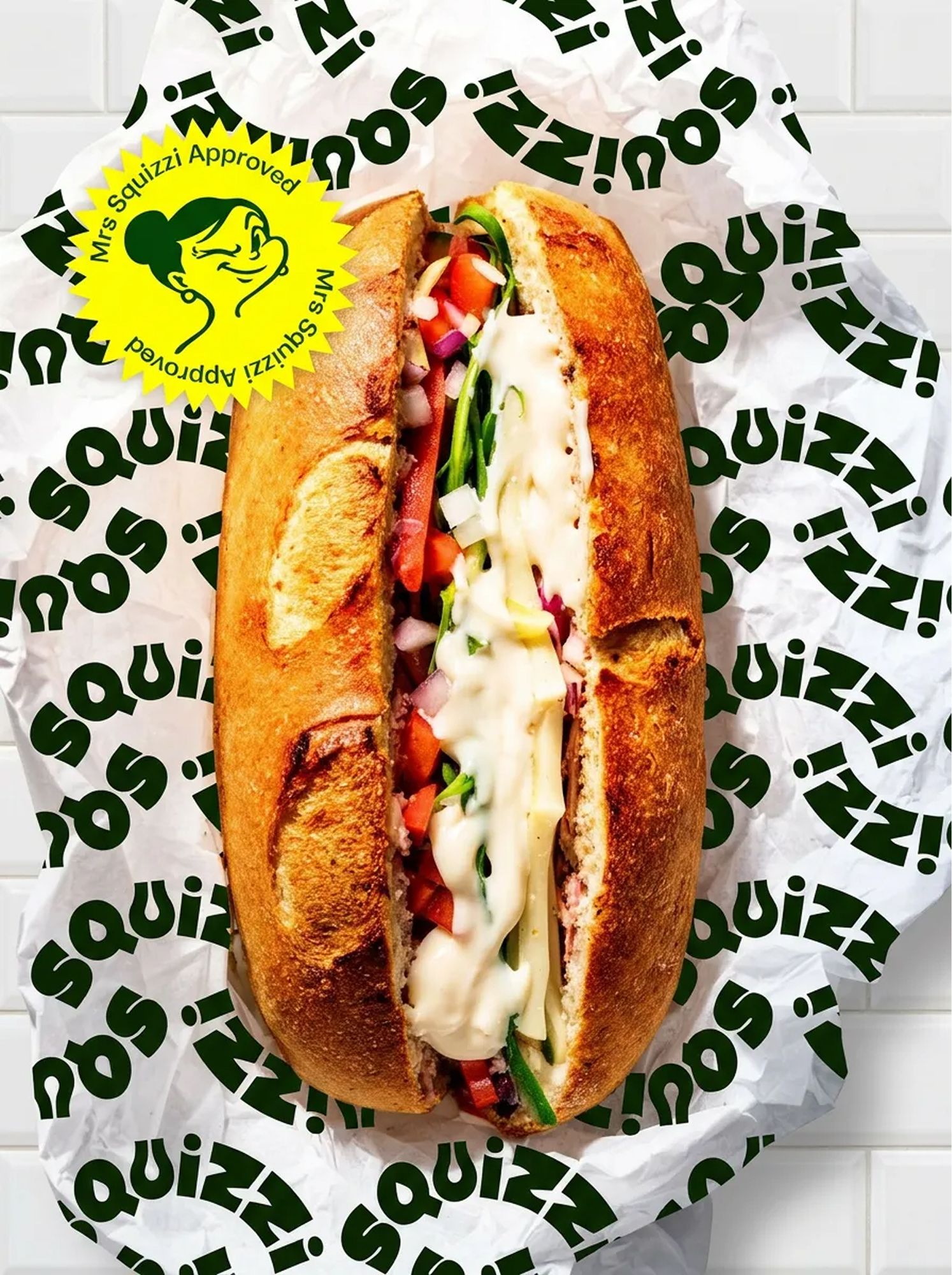 Squizzi olive oil sub roll on branded wrapper with approval sticker