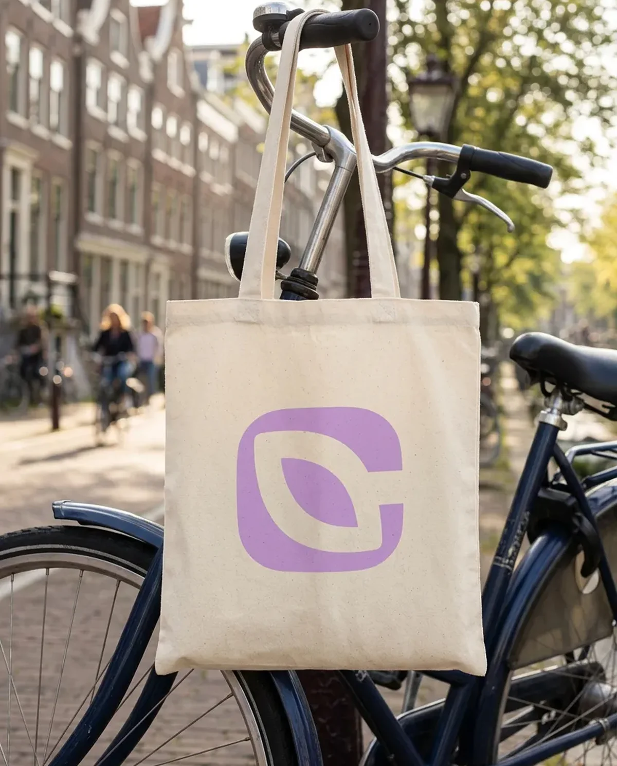 climascapes – Climascapes leaf logo on a tote bag hung from a bicycle