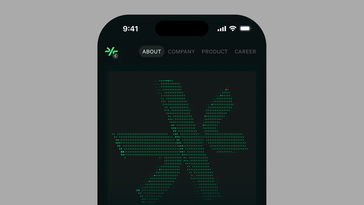 comulate – Close-up of Comulate mobile header and animated asterisk mark