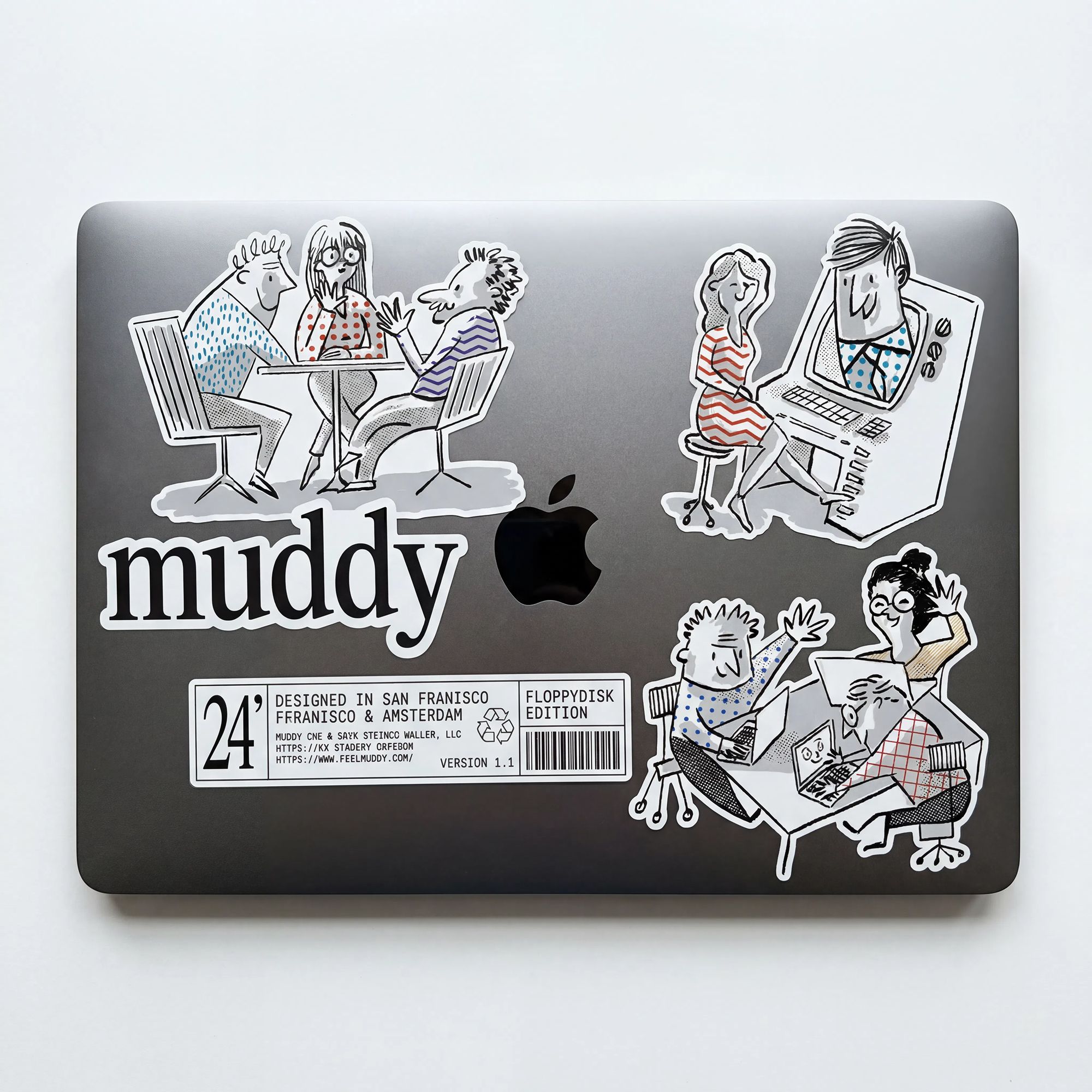 Muddy stickers on a macbook