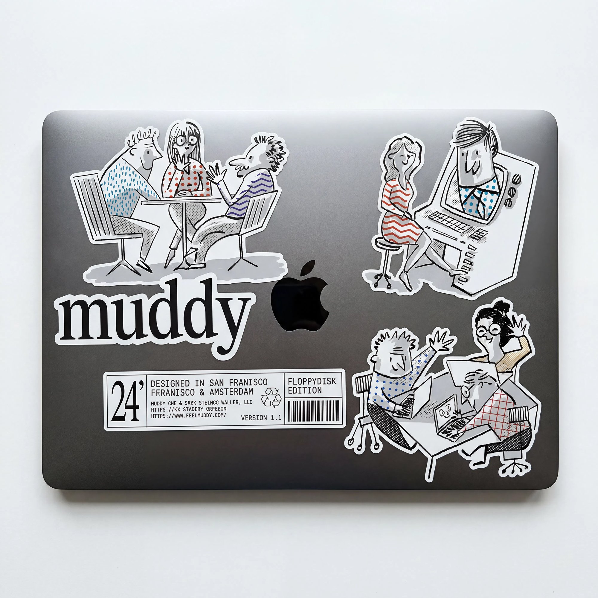 Muddy stickers on a macbook